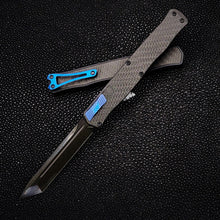 Heretic Knives Cleric II DLC Magnacut Tanto with Black ANO handles with CF inlays and CF top covers.