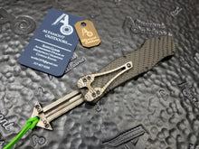 Heretic Knives Hydra Carbon Fiber, Flamed Ti charging Handle, Flamed Pocket Clip, Two-Tone DLC Blade Tanto