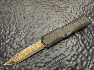 Heretic Knives Custom Colossus Hand Ground Baker Forge Damascus Recurve, Black ANO 6061-T6 handle w/Fat Carbon Black Dunes, DLC and FC button, DLC Satin Clip, DLC Hardware